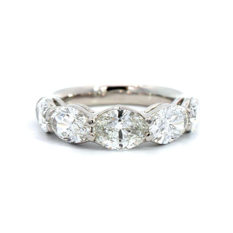 Platinum Shared Prong Oval Cut Graduating Diamond Band